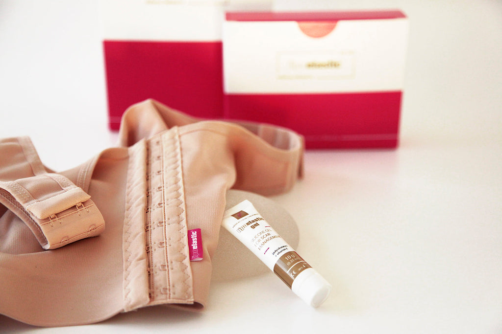 Lipoelastic Gel und Box auf rosa Hintergrund