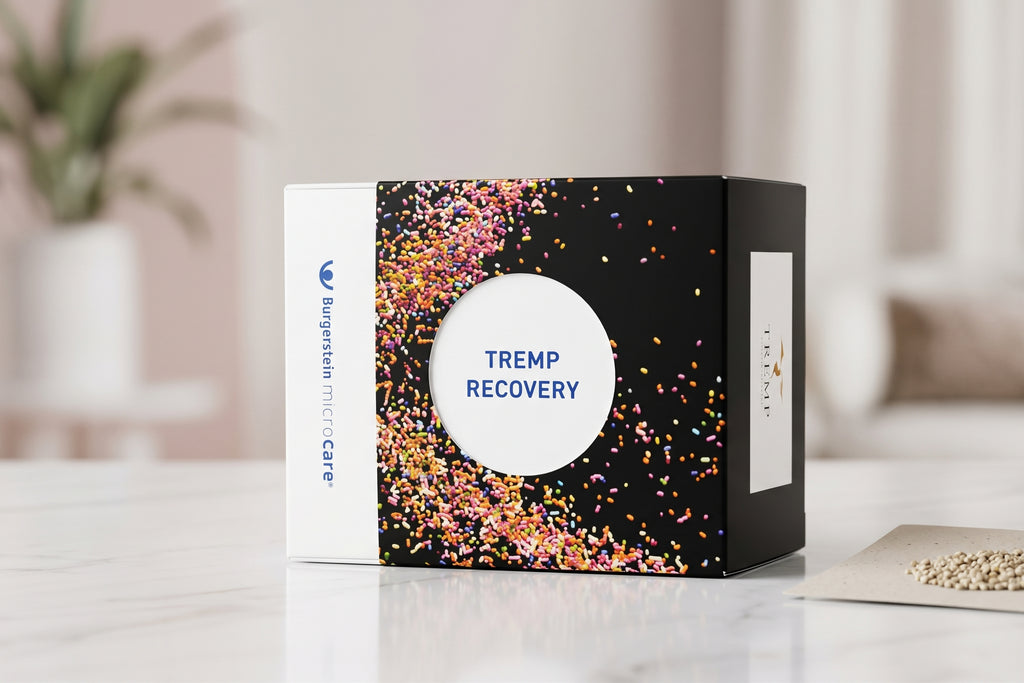TREMP Recovery von Burgerstein microCare – Verpackung mit seitlichem Logo auf Marmortisch